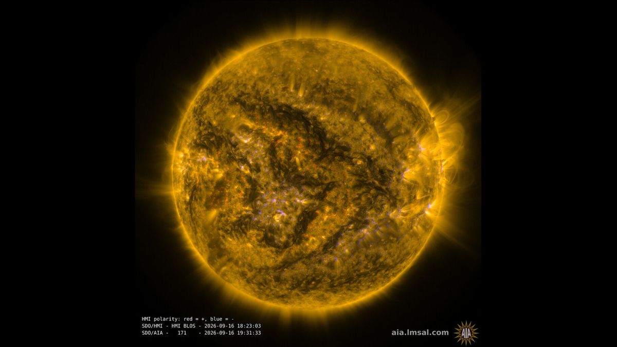 A view of a yellow sphere with some flares coming off of it.