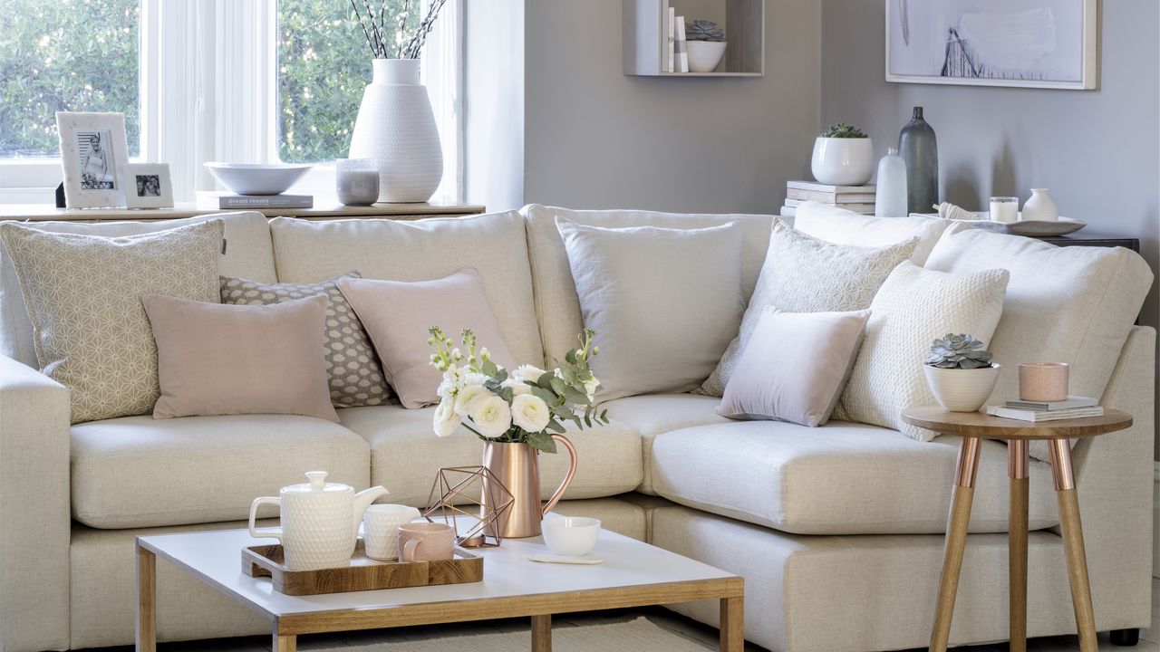 corner sofa in neutral pastel living room