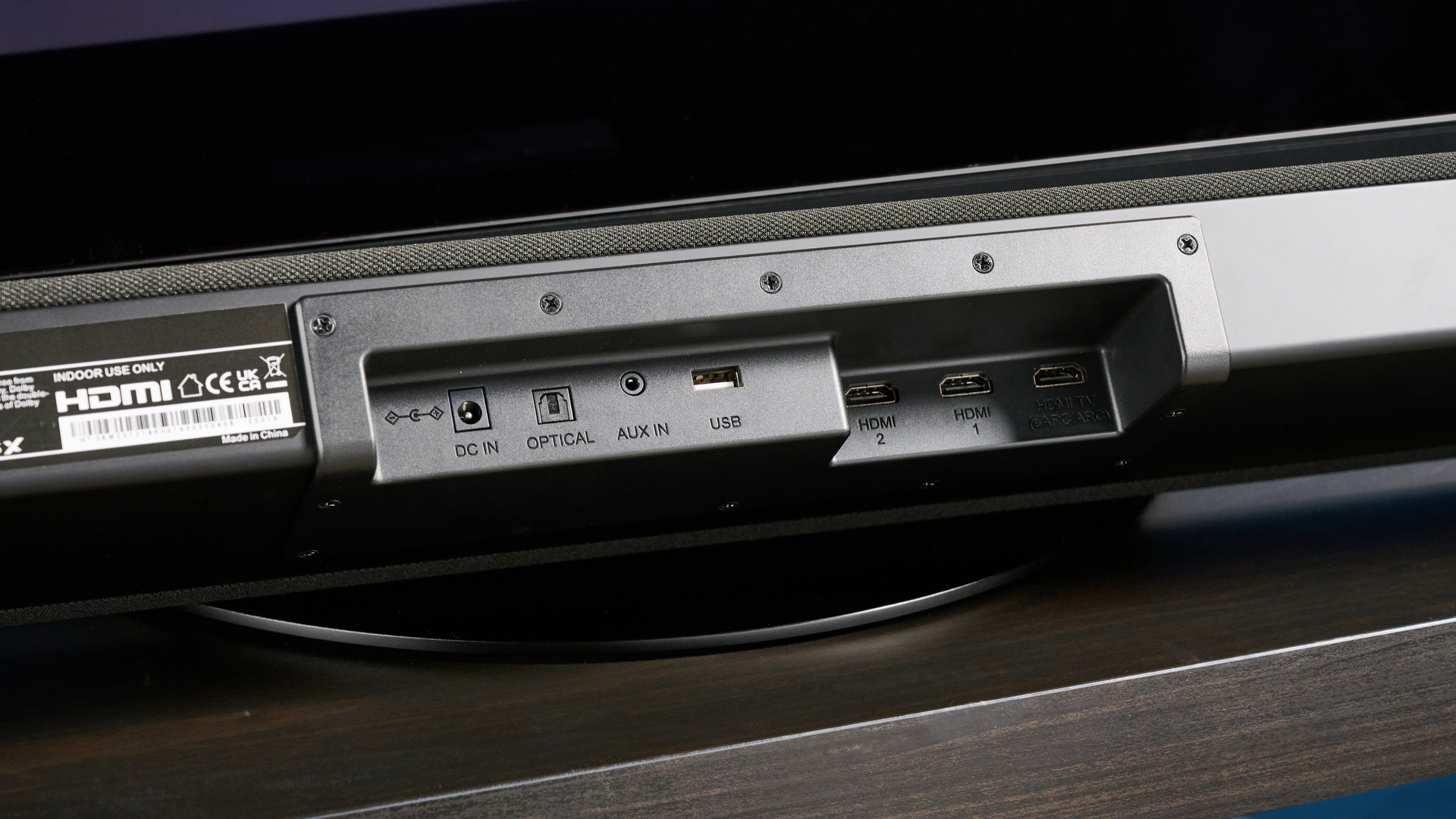 The Sharp 5.1.2 HT-SBW55121 Soundbar photographed in front of a blue background.
