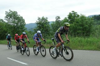 Team AG2R's French rider Bruno Armirail (L), Team Arkea's French rider Mathis Le Berre (2ndL), Team Alpecin's Belgian rider Xandro Meurisse (2ndR) and Team Q36.5's Italian rider Filippo Conca (R) and Team Lotto's Danish rider Jonas Gregaard Wilsly (3rdL) compete in the second stage of the 76th edition of the Criterium du Dauphine cycling race, 142km between Gannat and Col de la Loge, near La Chamba, central France, on June 3, 2024. (Photo by Thomas SAMSON / AFP)