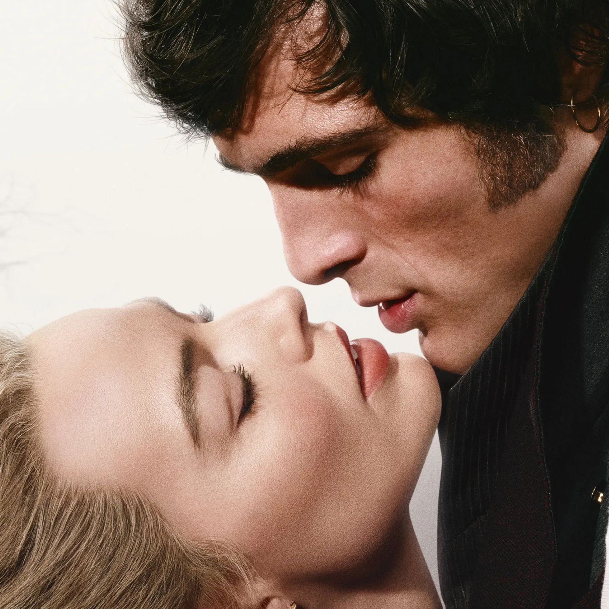 A swooning shot of Cathy and Heathcliff from Emerald Fennell's Wuthering Heights