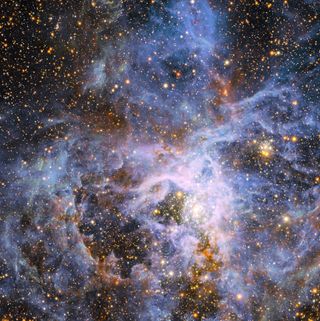 This view shows part of the very active star-forming region around the Tarantula Nebula in the Large Magellanic Cloud, a small neighbor of the Milky Way. At the exact center lies the brilliant but isolated star VFTS 682 and to its lower right the very rich star cluster R 136.