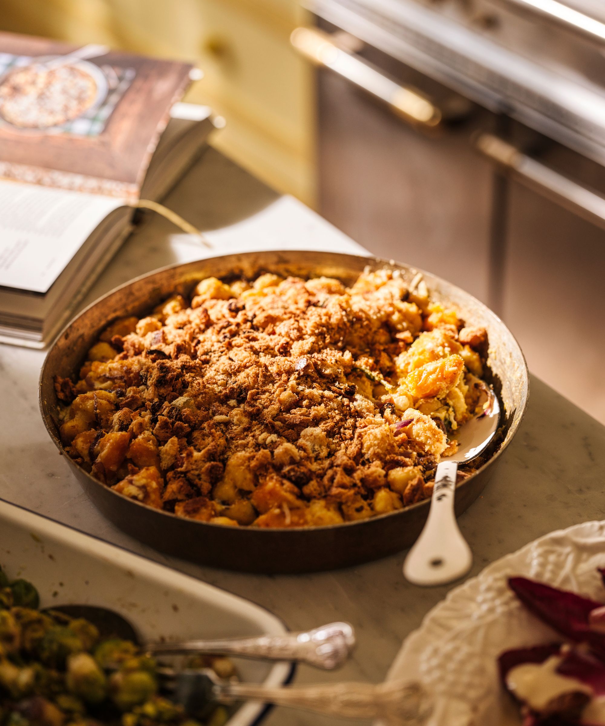 Pumpkin gnocchi gratin on a kitchen surface