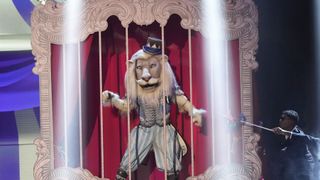 Sir Lion performs on The Masked Singer season 11