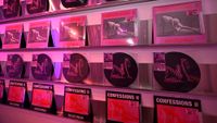 Confessions II by Madonna records on a wall