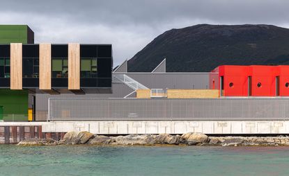 The colourful facades of Snøhetta’s fishing facility for the Holmen Industrial Area in Norway