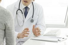 doctor talking to patient