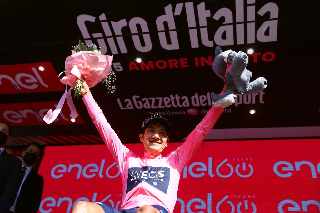 TURIN ITALY MAY 21 Richard Carapaz of Ecuador and Team INEOS Grenadiers celebrates winning the pink leader jersey on the podium ceremony after the 105th Giro dItalia 2022 Stage 14 a 147km stage from Santena to Torino Giro WorldTour on May 21 2022 in Turin Italy Photo by Michael SteeleGetty Images