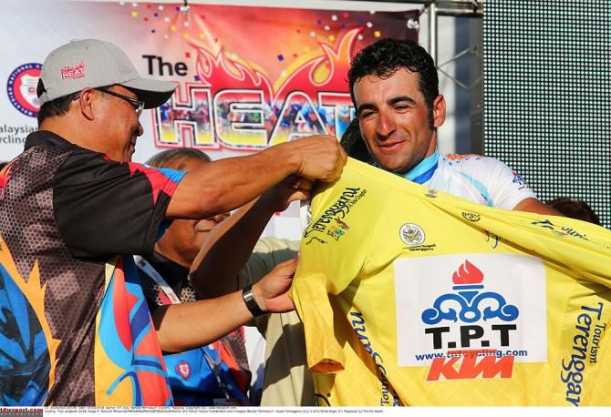 Mirsamad Pourseyedigolakhour dons the yellow jersey