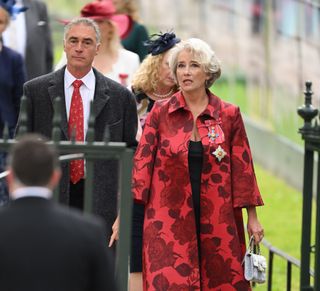 Dame Emma Thompson and husband Greg Wise (left) arrive at Westminster Abbey ahead of the Coronation of King Charles III and Queen Camilla on May 6, 2023 in London, England. The Coronation of Charles III and his wife, Camilla, as King and Queen of the United Kingdom of Great Britain and Northern Ireland, and the other Commonwealth realms takes place at Westminster Abbey today. Charles acceded to the throne on 8 September 2022, upon the death of his mother, Elizabeth II. (Photo by Jane Barlow - WPA Pool/Getty Images)
