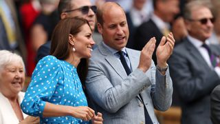 Catherine, Duchess of Cambridge and Prince William, Duke of Cambridge watch from the Royal Box
