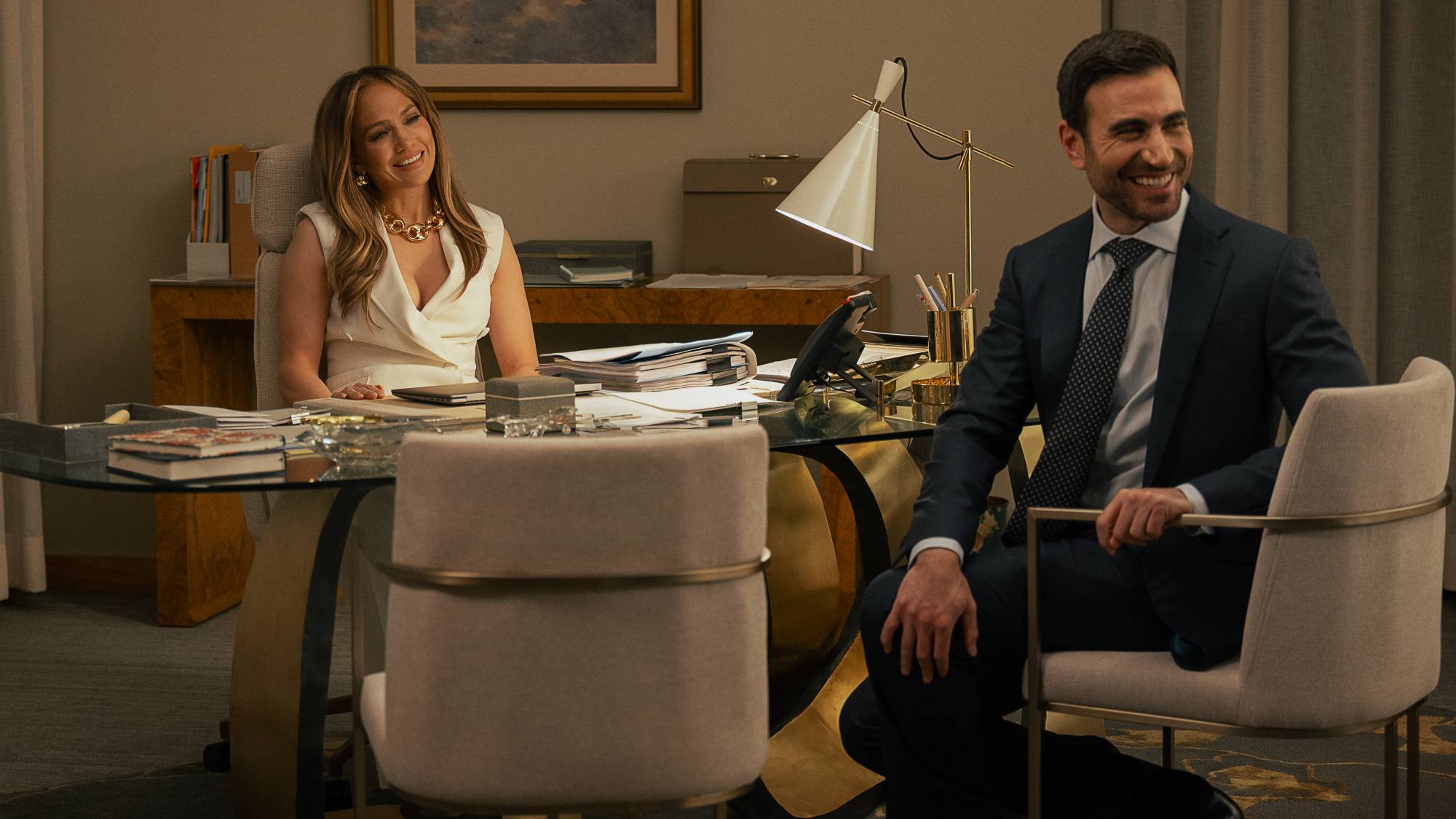 (L-R) Jennifer Lopez as Jackie Cruz and Brett Goldstein as Daniel Blanchflower in "Office Romance"