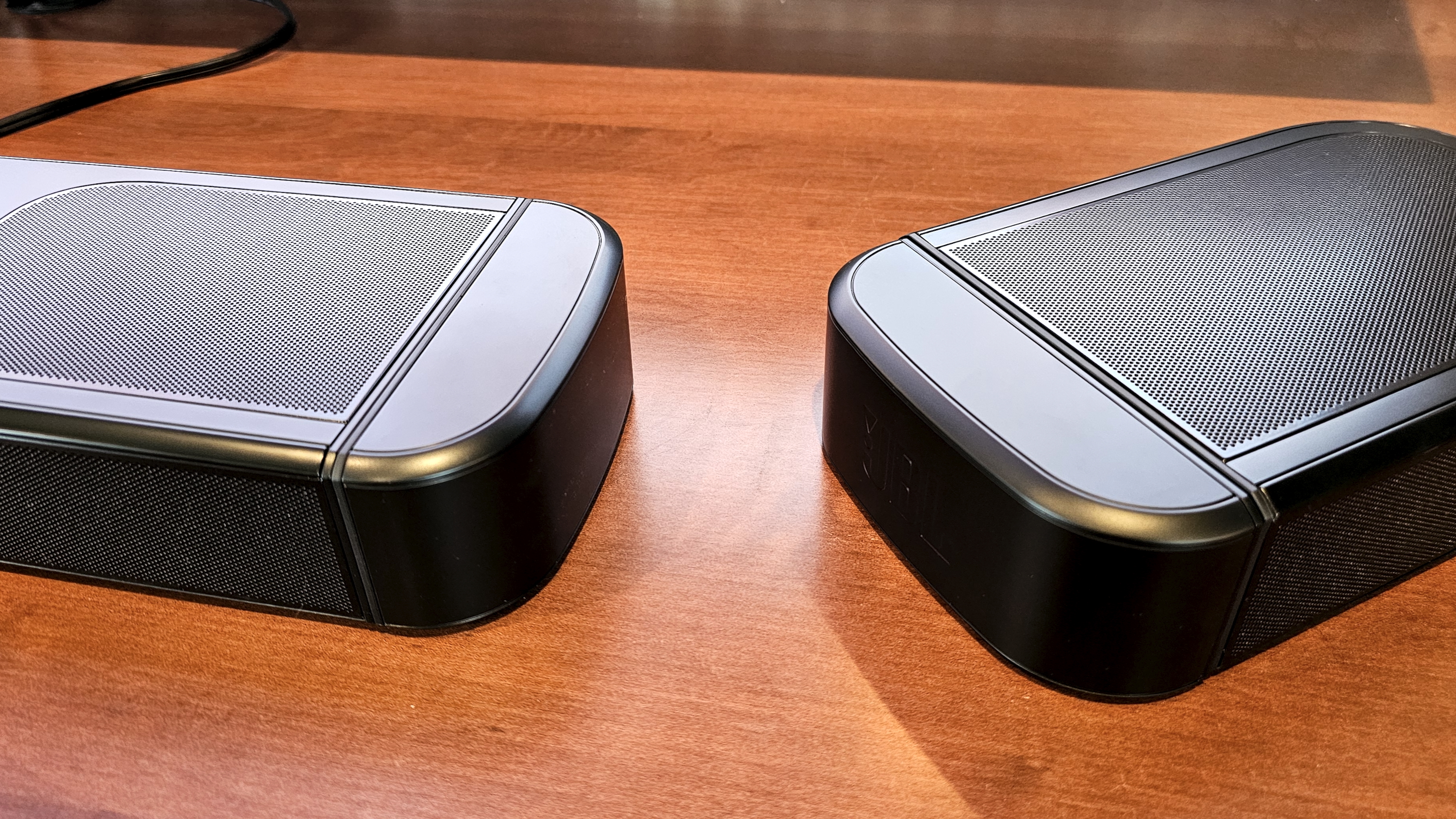 JBL Bar 1000MK2 gallery showing ports and surround speaker docking and power options