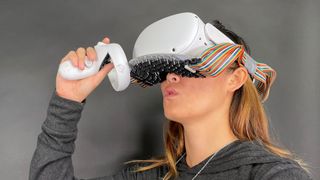 an Oculus Quest 2 fitted with mouth haptics