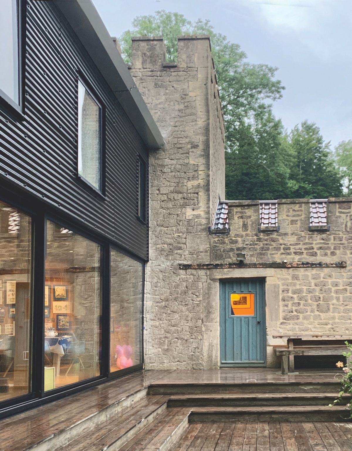 Originally designed to feel as if they were camping in the treetops, the first floor now features less glazing than the original design. The old folly was also recently completed after years of renovating and provides as cosy master bedroom for Piers and Sue.