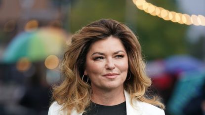 Shania Twain recalls her difficult childhood as she reflects on how her parents struggled to financially support her and her siblings