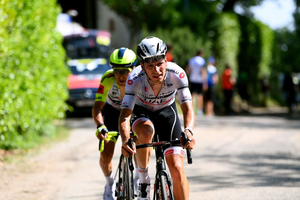 TURIN ITALY MAY 21 LR Domenico Pozzovivo of Italy and Team Intermarch Wanty Gobert Matriaux and Joo Almeida of Portugal and UAE Team Emirates White Best Young Rider Jersey compete during the 105th Giro dItalia 2022 Stage 14 a 147km stage from Santena to Torino Giro WorldTour on May 21 2022 in Turin Italy Photo by Tim de WaeleGetty Images