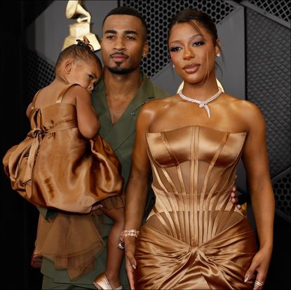 John Gaines, Victoria Monét and Hazel Monét arrives on the Red Carpet at the 66th Grammy Awards