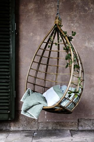 hanging egg chair from Beaumonde on patio