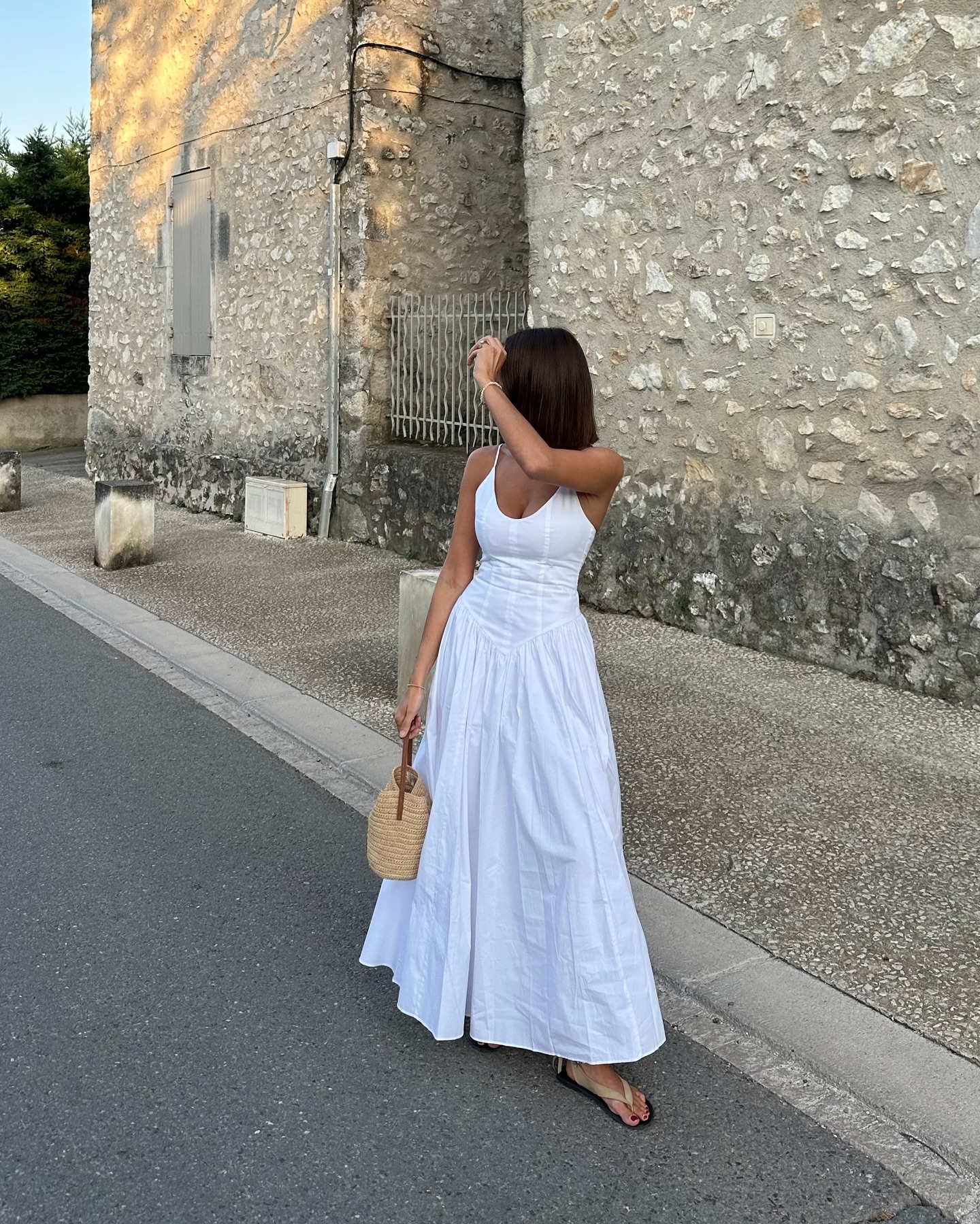 Marianne Smyth wears strappy suede sandals.