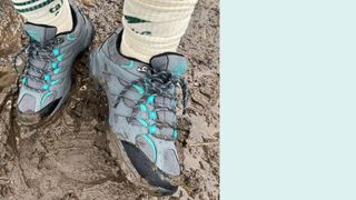 Jack Walker Lily Outdoor Shoes in mud with mud caked on the side of the shoes as worn by Susan Griffin