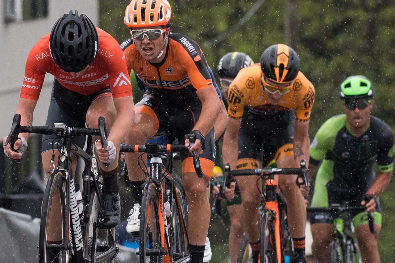 The breakaway struggles on the climb trying to stay ahead of the charging field and attempting to reel in Robin Carpenter.