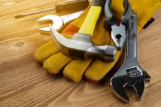Tools For Building A House Or Repairing An Apartment, On A Wooden Table or Background. 
