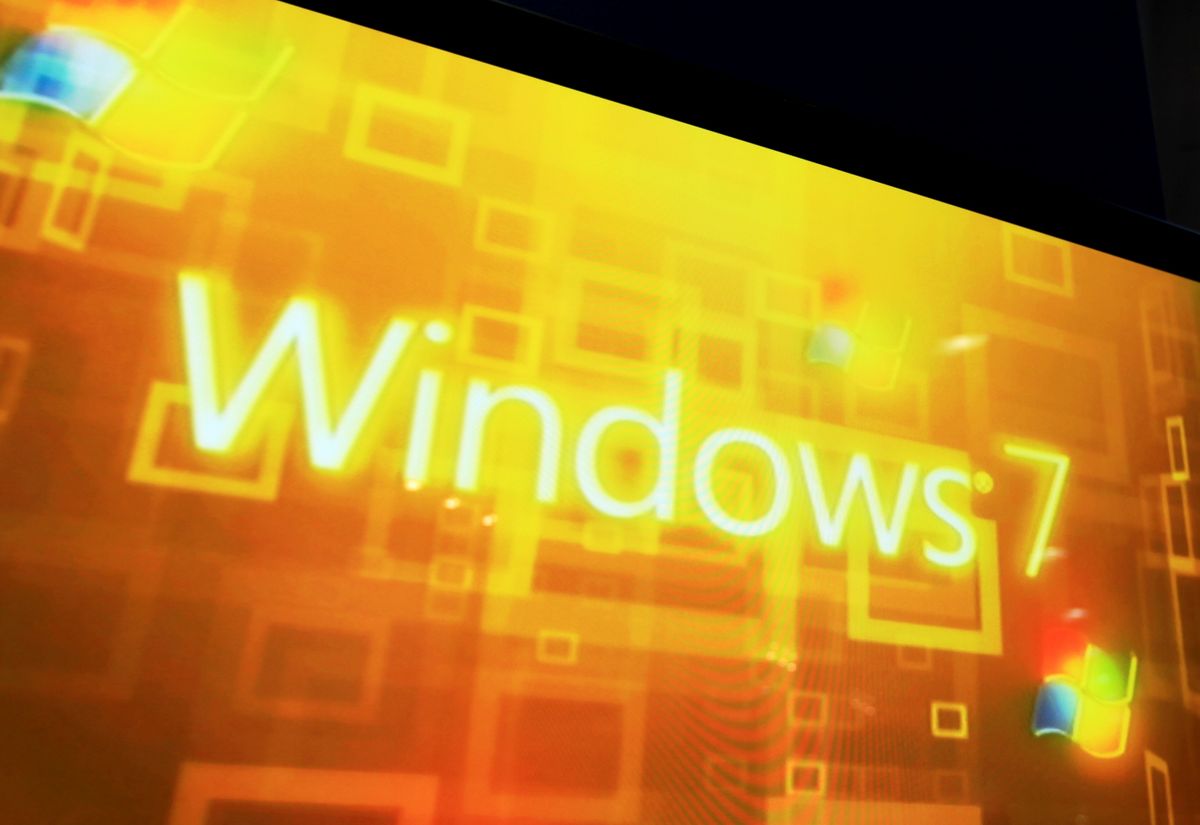 The Windows 7 branding shown on a massive screen