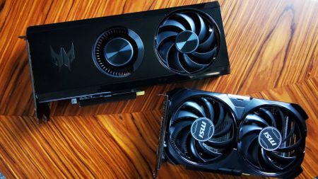 Nvidia RTX 4060 and AMD RX 7600 GPUs on woodgrain