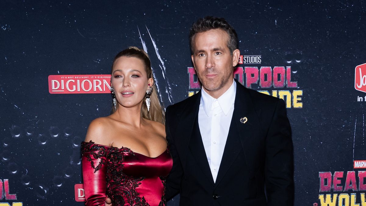 Blake Lively and Ryan Reynolds posing at the Deadpool 3 NY premiere