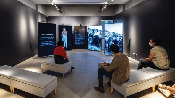 Shure microphones help bring history to life at a Jewish museum where guests listen intently. 