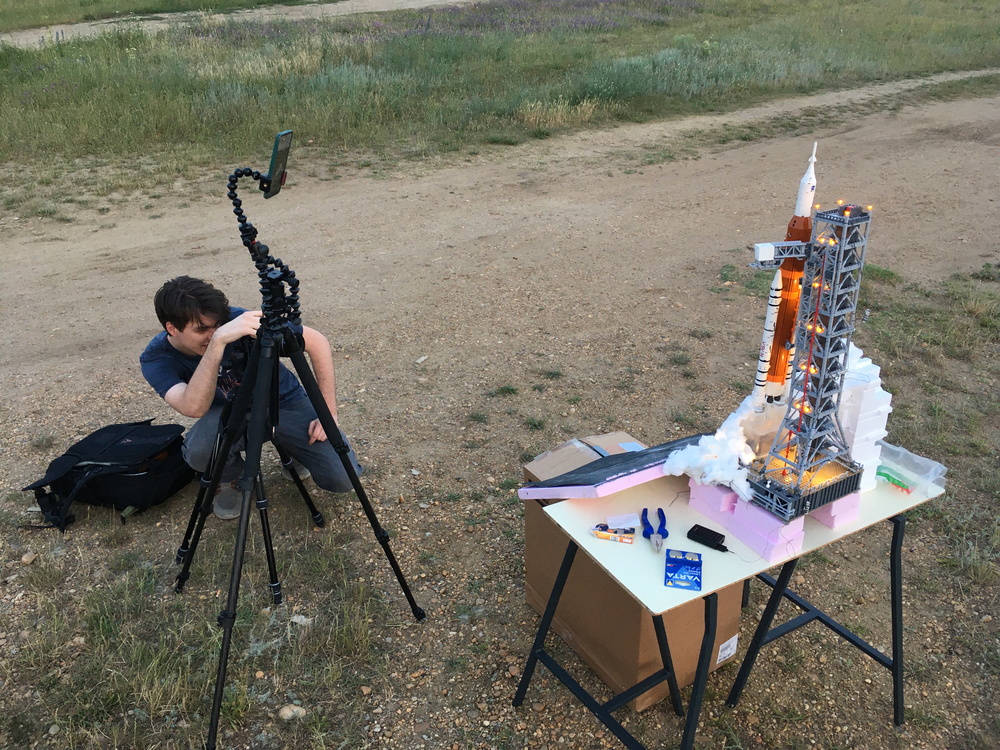 Behind-the-scenes shots of Lampert creating his Lego Artemis project