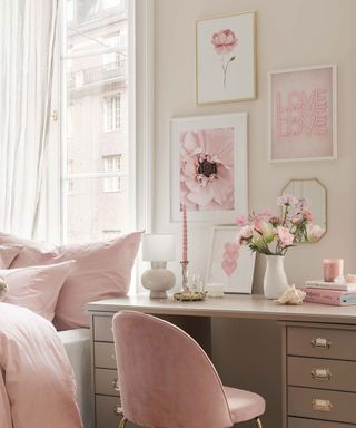 pink bedroom with wooden desk