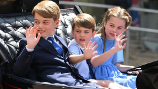 Prince George, Princess Charlotte and Prince Louis in the carriage procession at Trooping the Colour during Queen Elizabeth II Platinum Jubilee on June 02, 2022 in London, England