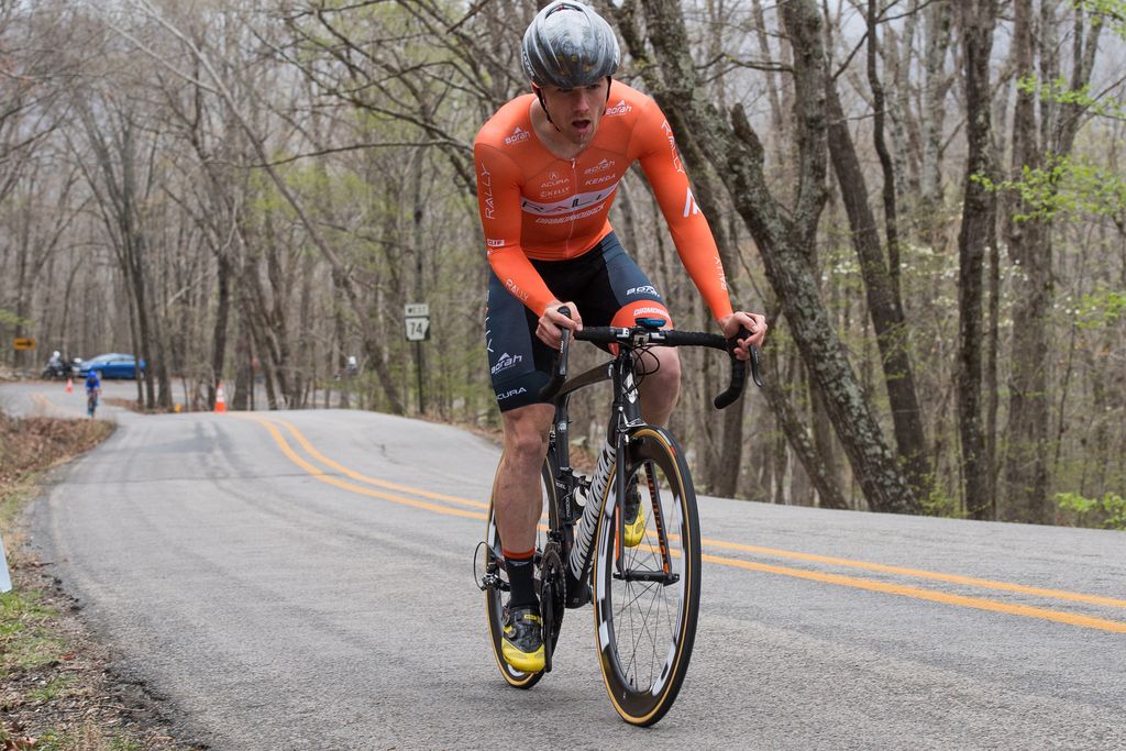 A Rally riders tries to get more power from the pedals