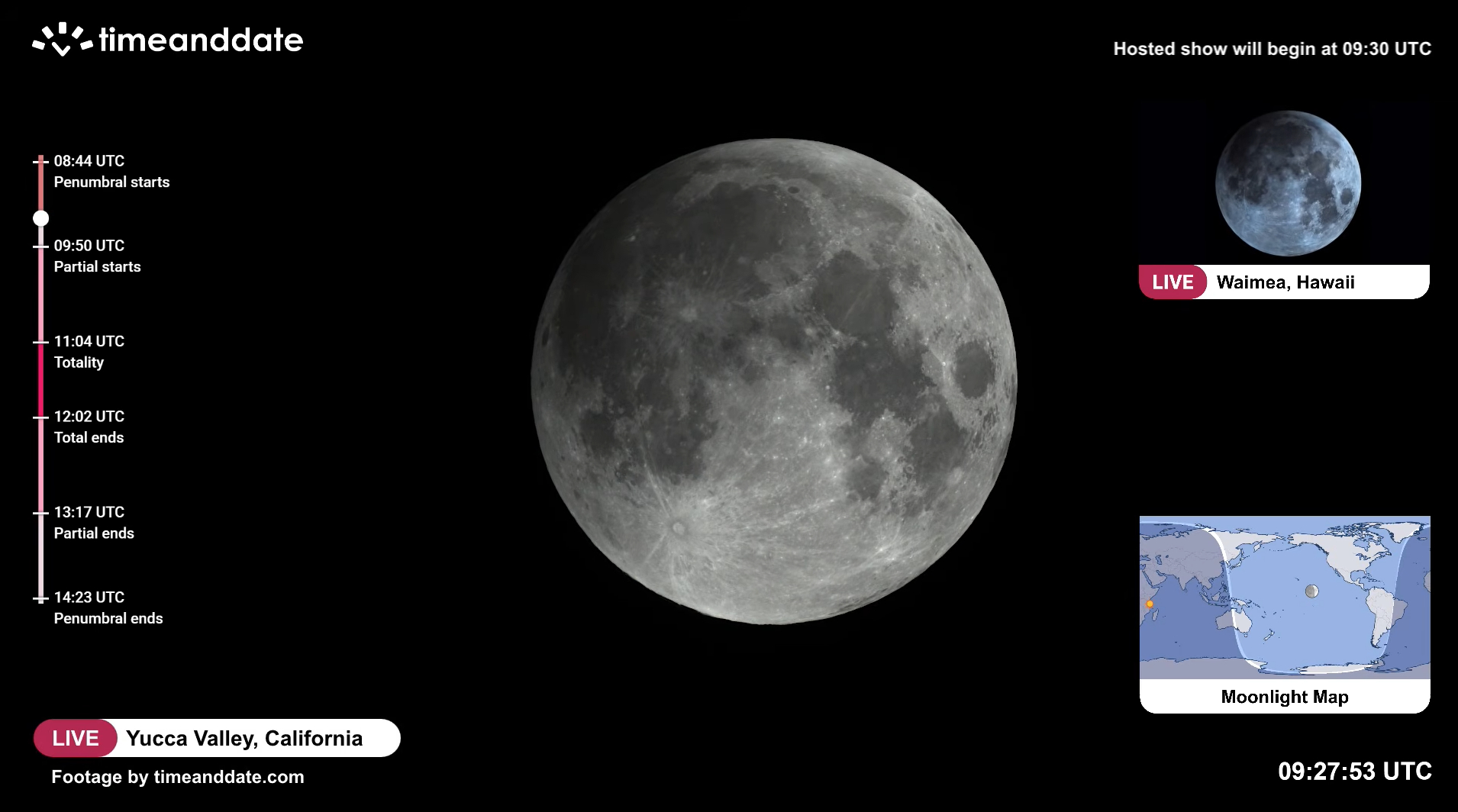 close up view of the moon with a dark patch appearing in upper left corner