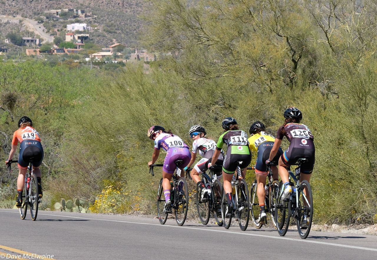 Emma White (Rally Cycling) off the front while other riders checked the position of their teammates