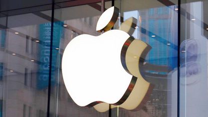 Apple stock: apple logo on outside of building