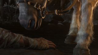 Elden Ring - A horse's nose touches the hand of a person on the ground