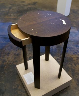 Grand Prize Winner of the NASA/Etsy contest was the Northstar Table by Colleen and Eric Whiteley of Brooklyn, NY. The table features a hidden compartment that can be opened by pressing one of the stars on its surface. The Northstar Table won Best of Show,
