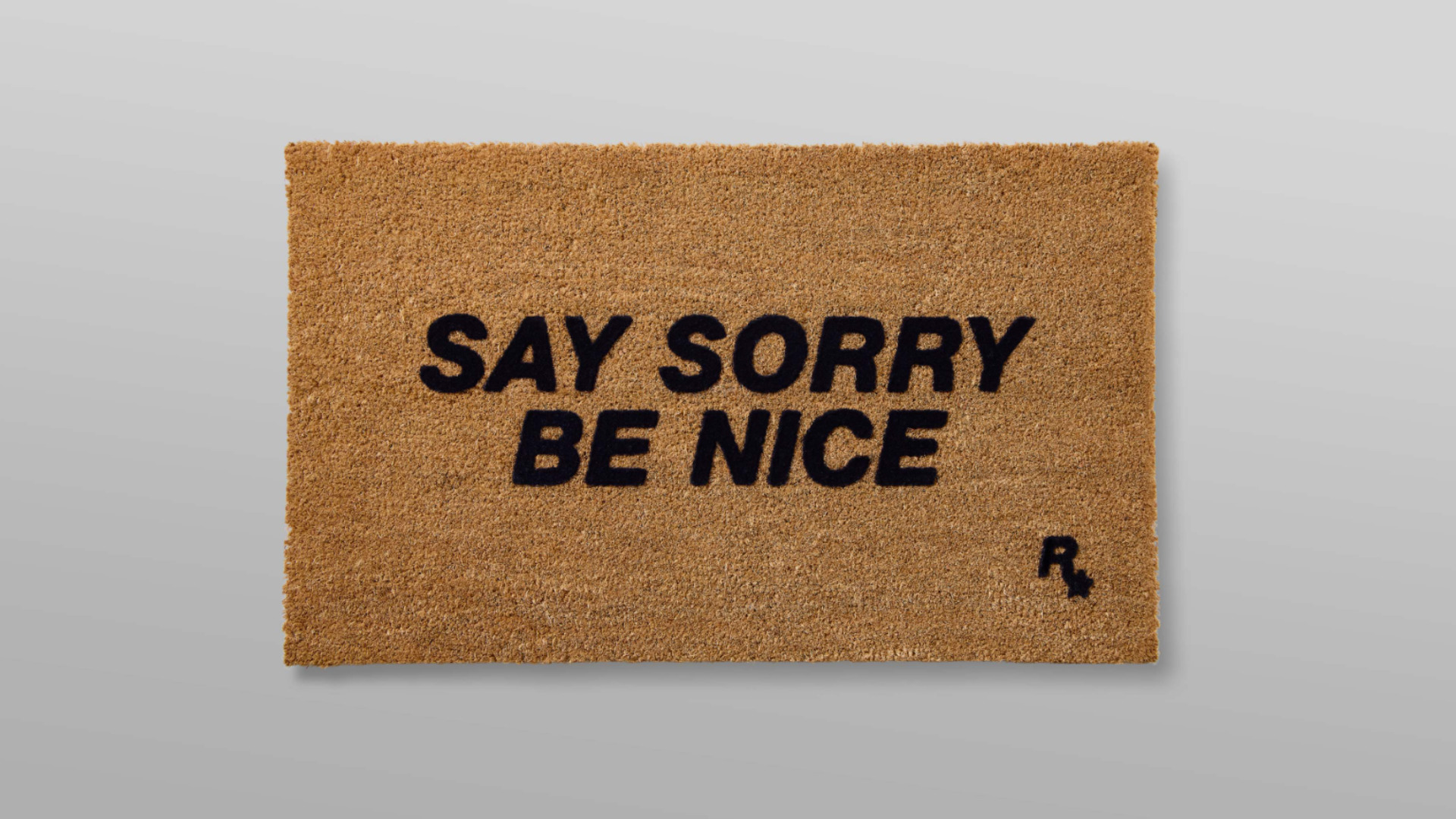 Rockstar welcome mat with &#039;Say Sorry, Be Nice&#039; on it