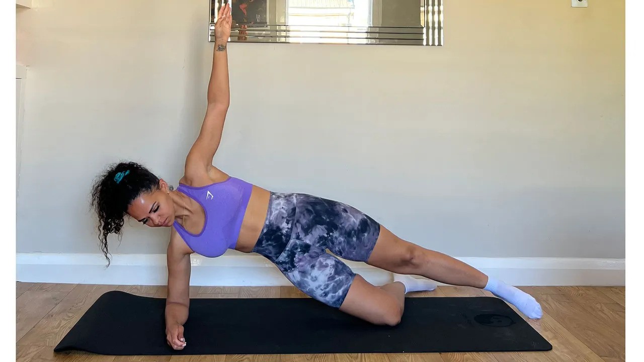 Jade demonstrating the modified side plank position