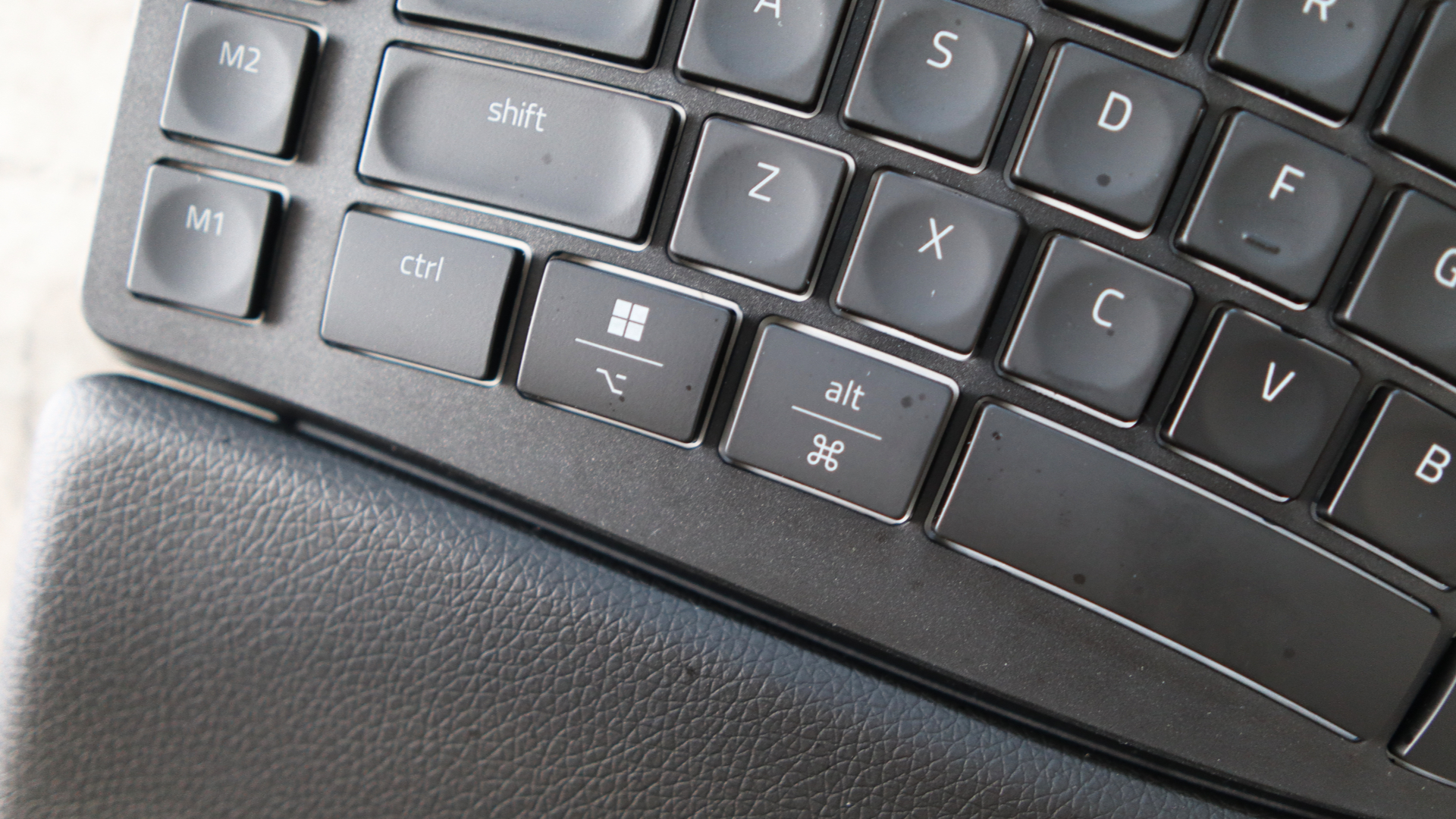 Razer Pro Type Ergo ergonomic keyboard on marble surface