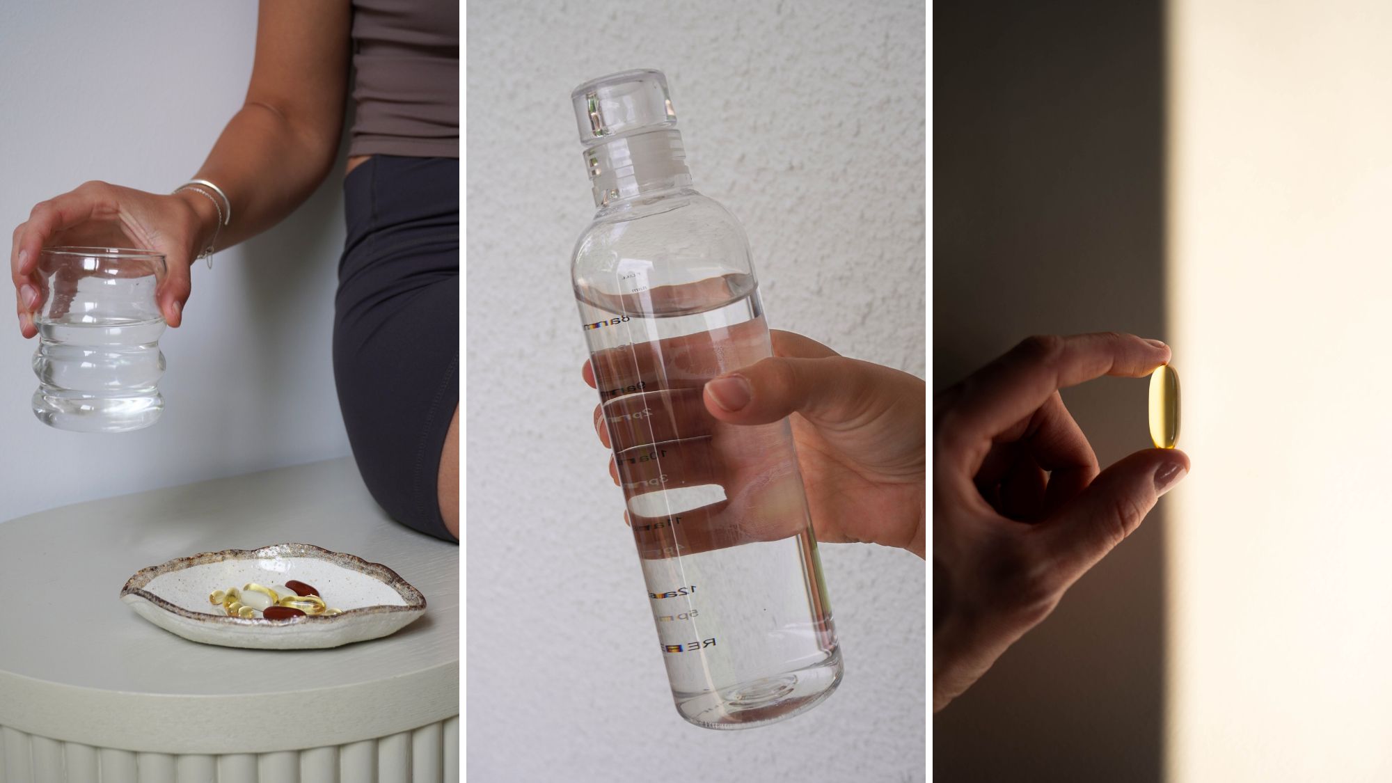 A woman taking supplements: a water glass, bottle, and stack of supplements