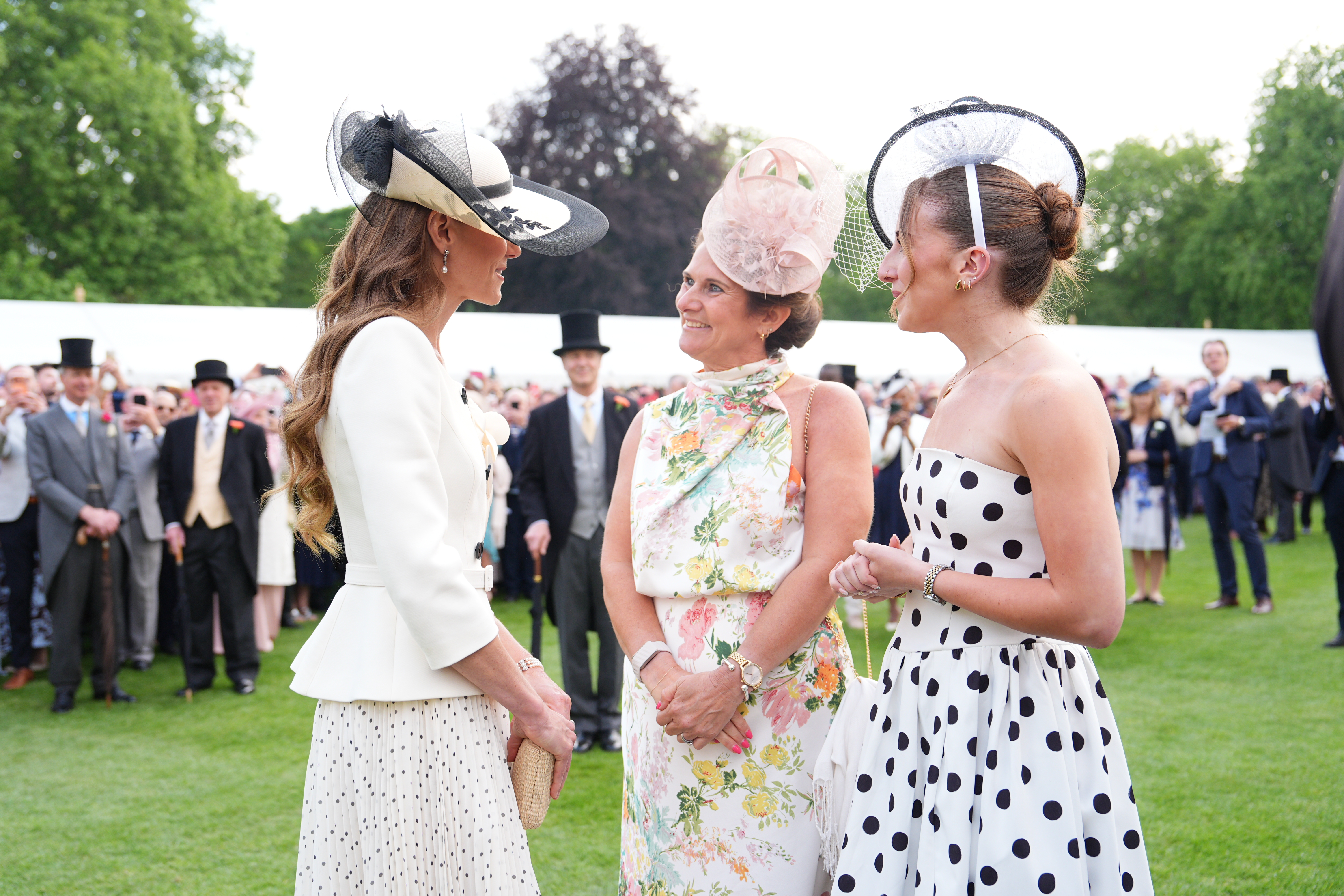 Catherine, Princess of Wales, meets Rhian Mannings (centre) during a Royal Garden Party at Buckingham Palace on May 8, 2026 in London, England. (Photo by Aaron Chown - WPA Pool/Getty Images)