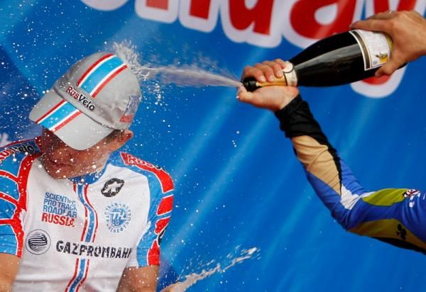 Champagne shower for stage winner Krasnov