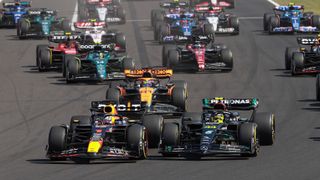 Max Verstappen and Lewis Hamilton going head to herd at turn 1 on an F1 live stream