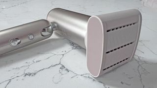 The Dreame Pocket Hair Dryer with its Unfrizz Nozzle attached