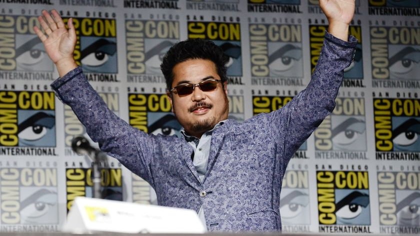 Katsuhiro Harada waving his arms