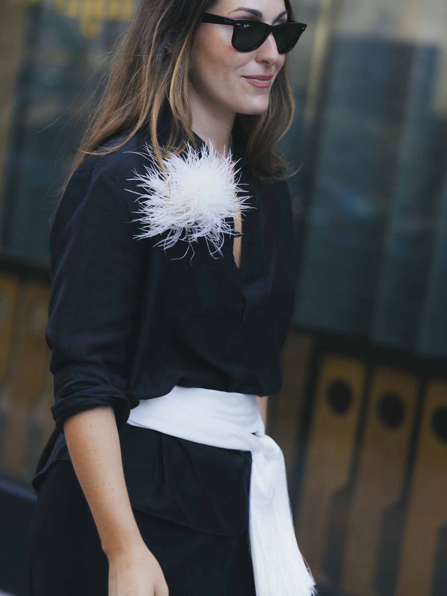 Anna Laplaca wearing Ray-Ban Wayfarer sunglasses during New York Fashion Week.